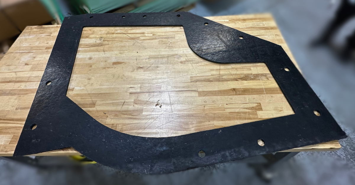 A custom cut of SA-47 material for a wood chipper.