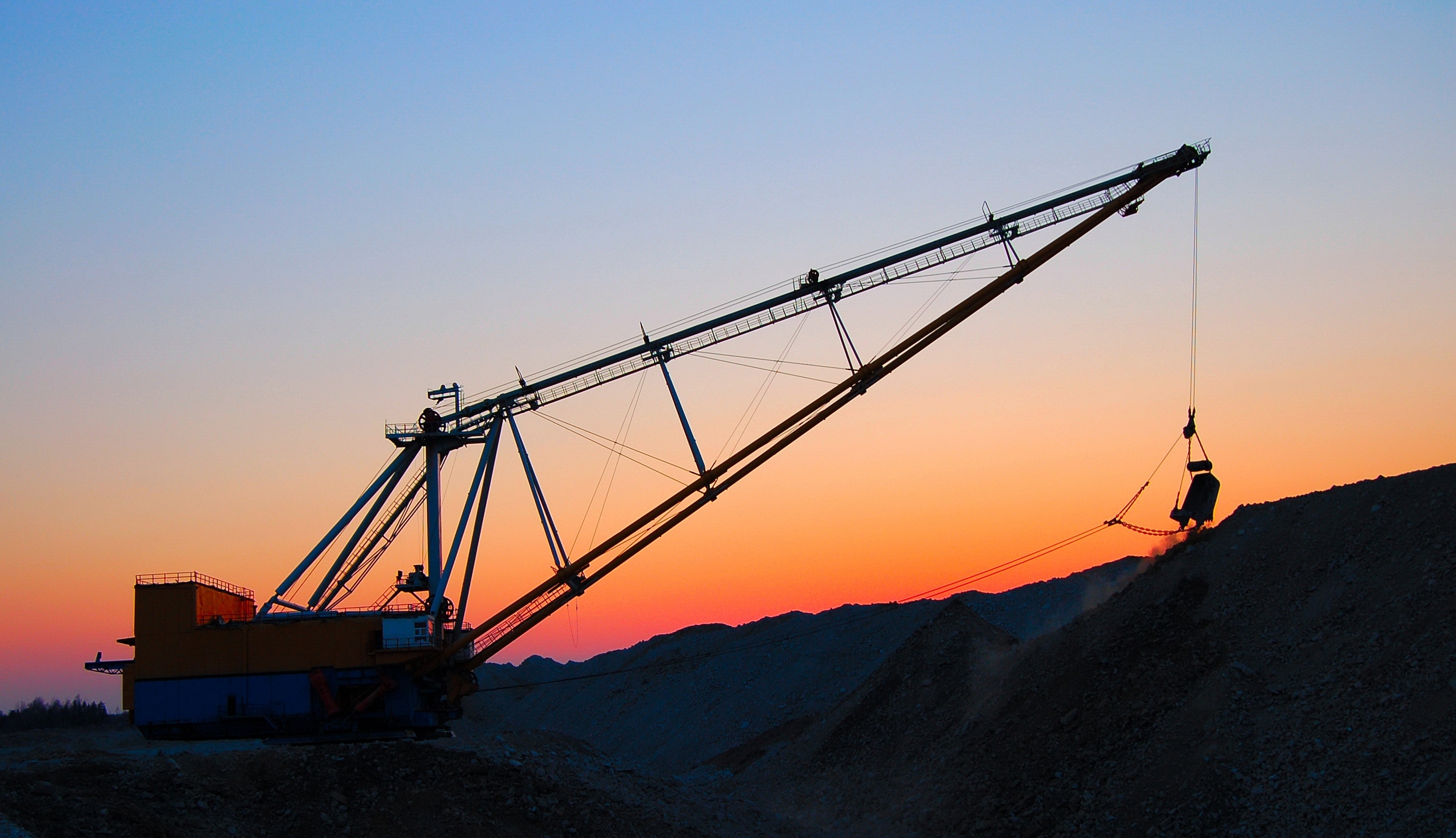 dragline excavator in the sunset
