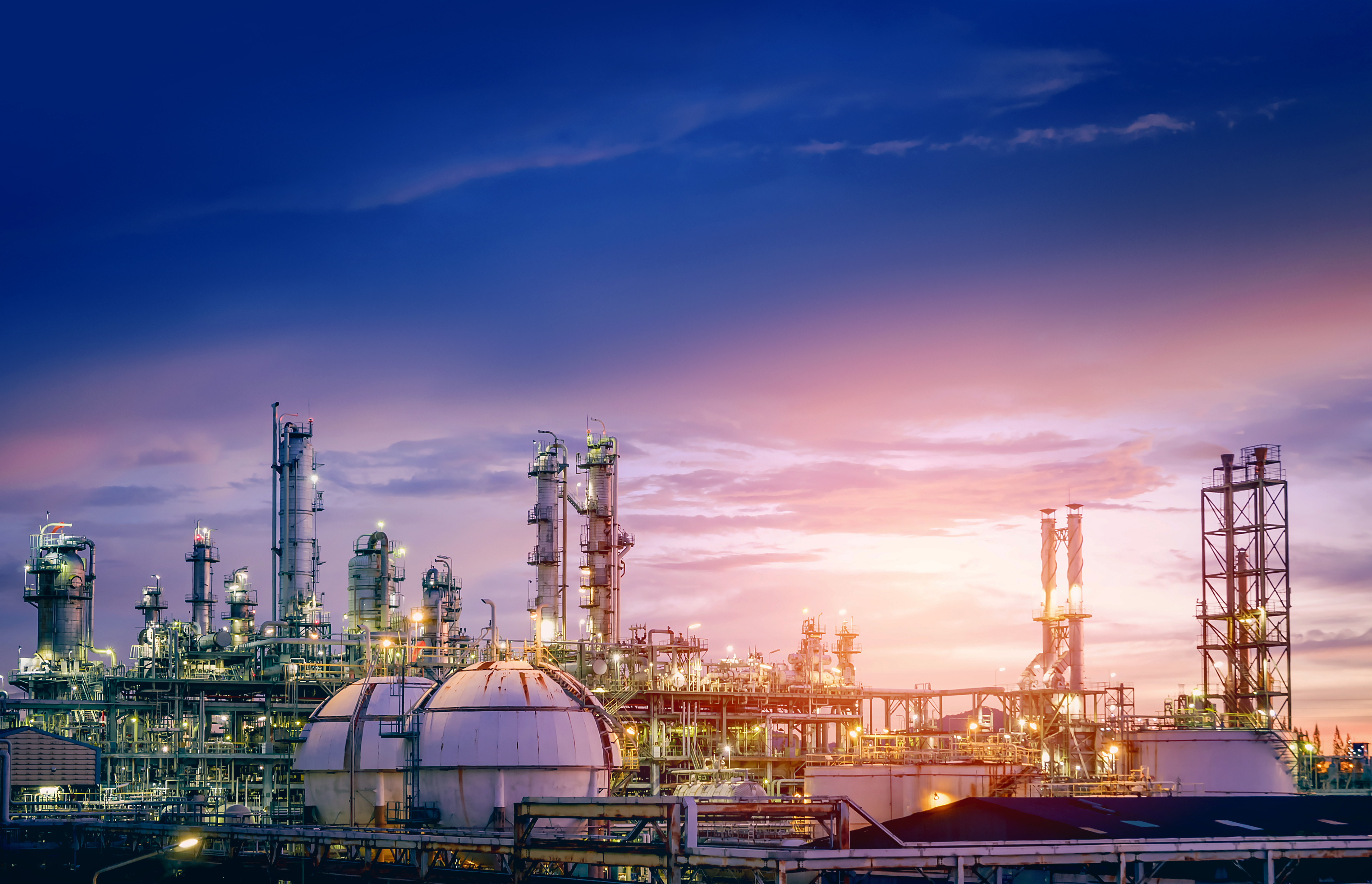 Oil refinery at sunset