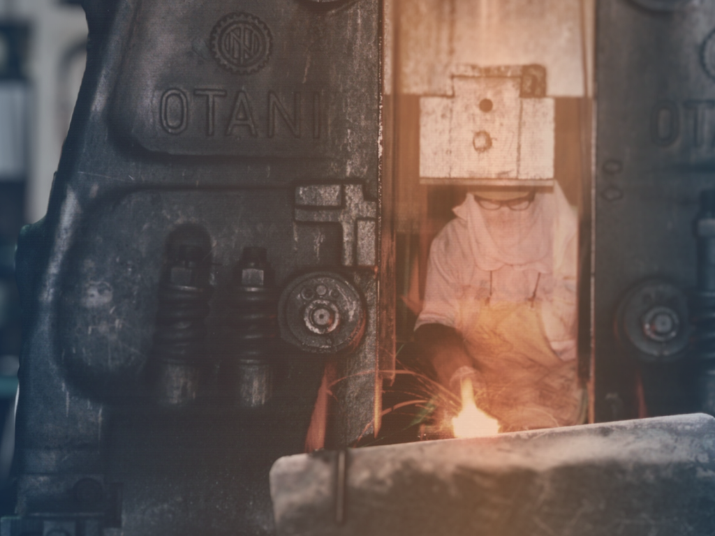 Forging Stronger Foundations: The Role of Shock Control in the Forging Industry in white text over an image of a large, industrial anvil and hammer.
